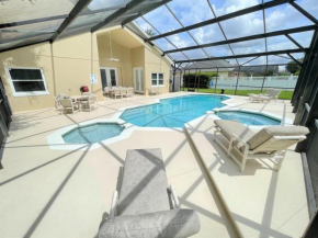 Mickeys Circle - Gorgeous! Modern 6BR, with Private South Facing Pool Hot Tub BBQ Theater 2 Miles to Disney